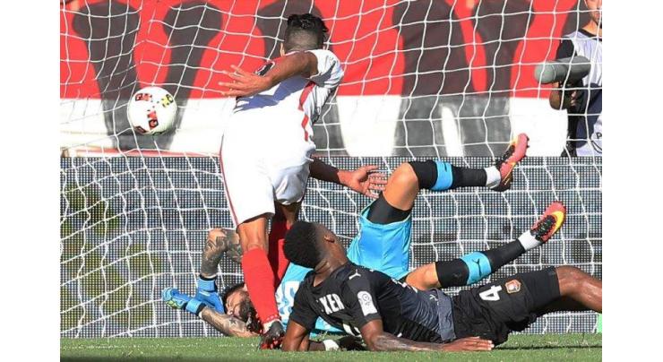 Football: Falcao header fires Monaco top 