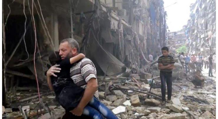 Dozens of air strikes in Syria's Aleppo 