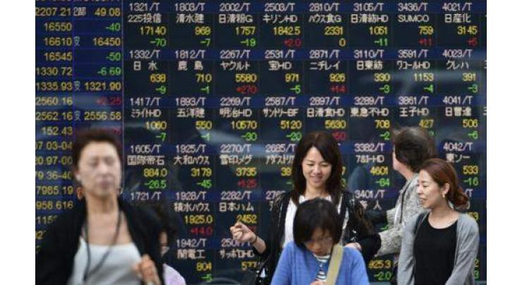 Tokyo stocks down on yen surge 