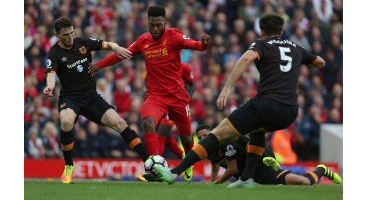 Football: Coutinho shines as five-star Liverpool rout Hull 