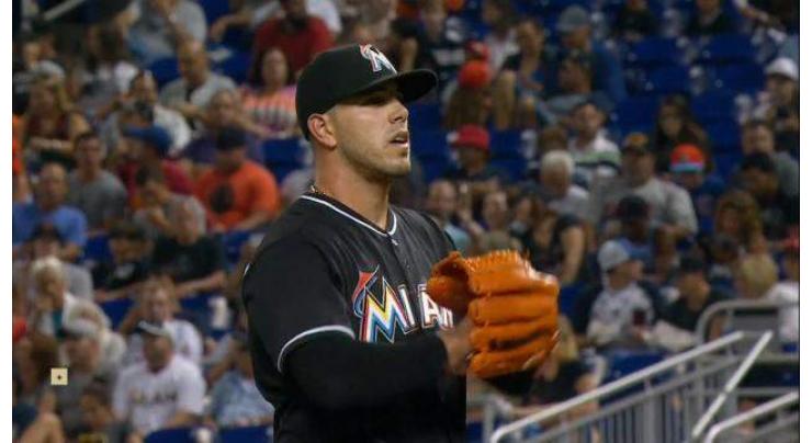 Baseball: Marlins don late pitcher's jersey in tribute 