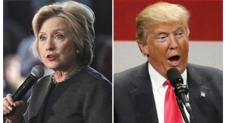 Trump, Clinton lock horns on taxes, email controversy 