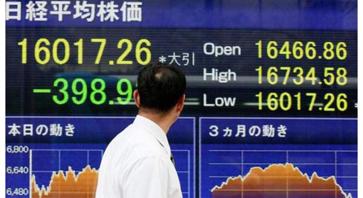 Tokyo shares open lower over strong yen 