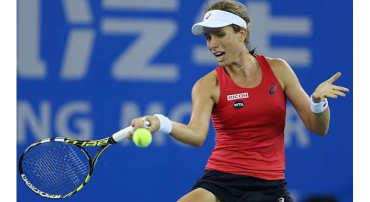 Tennis: 'Brave' Konta battles into final eight at Wuhan 