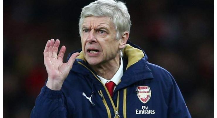 Wenger says England job a possibility one day 