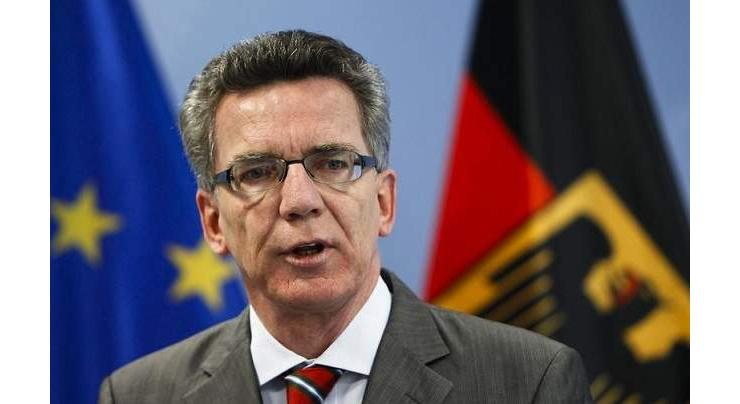 Germany revises down 2015 refugee arrivals to 890,000 