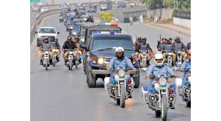 Police, Rangers, Army hold flag march 