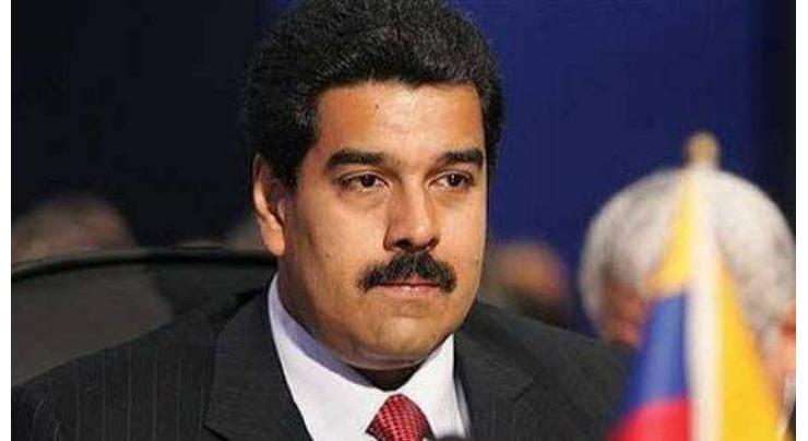 Venezuela president urges 'new mechanism' for higher oil prices 
