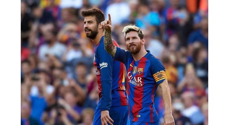 Football: Messi scores on return in Barca rout, Sevilla top 