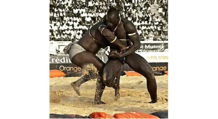 Senegal wrestling star throws in loincloth after 24 years 