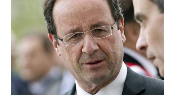 Plunge in French joblessness gives Hollande rare boost 