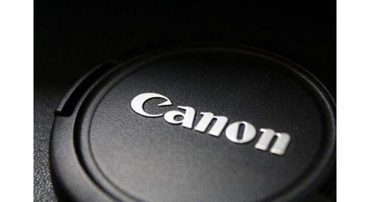 Canon slashes profit view on sales tumble, strong yen 