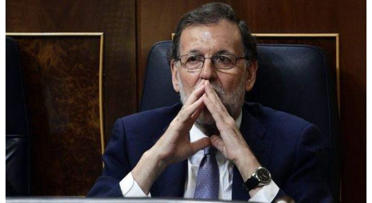 Tough road ahead, Spain PM warns before return to power 