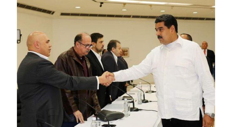 Maduro, opposition begin crisis talks in Venezuela 