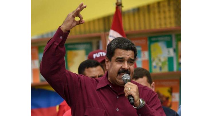 Venezuela govt, mistrustful rivals in crisis talks 