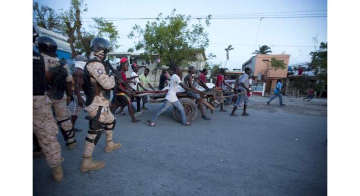 Teen shot dead in Haiti amid tension over aid delays 
