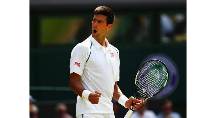 Tennis: Djokovic eases into Paris Masters last 16 