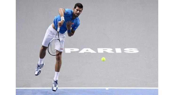 Tennis: Djokovic eases into Paris Masters last 16 