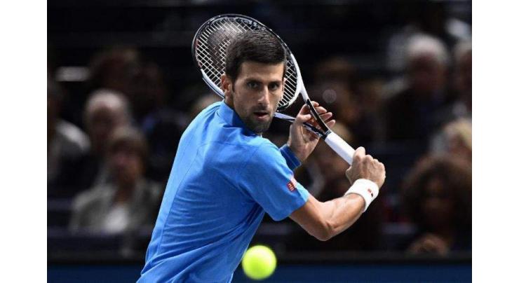 Tennis: Djokovic laughs off 'guru' claims 