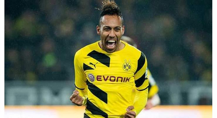 Dortmund down Sporting to advance, Aubameyang suspended 