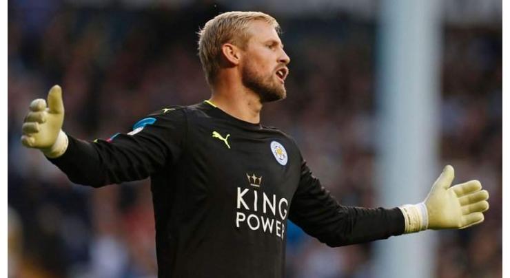 Football: Schmeichel out for a month with broken hand 