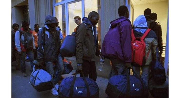 Last buses leave Calais 'Jungle' with women, children 