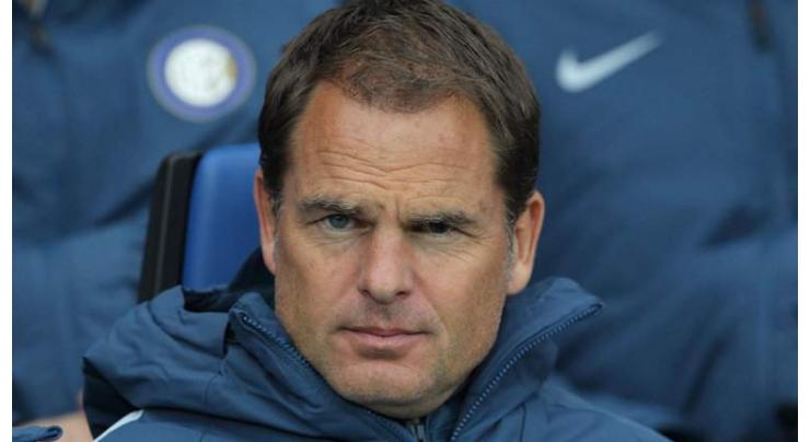 Football: Inter owners fly in to elect de Boer successor 