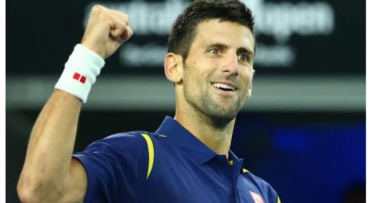 Tennis: Djokovic holds off Dimitrov to reach Paris quarters 