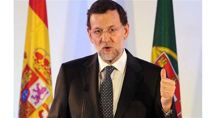 Spain's Rajoy forms new EU-looking government 