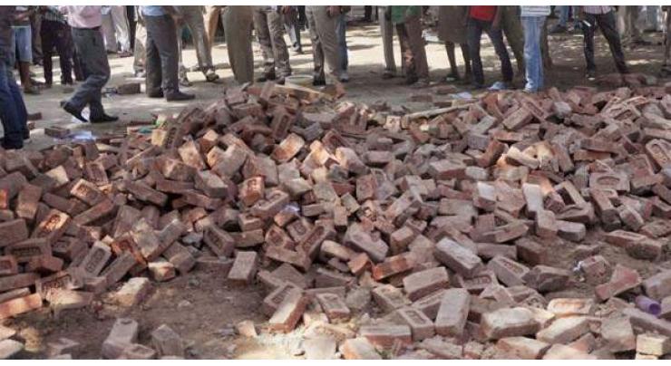 Two labourers killed in wall collapse 