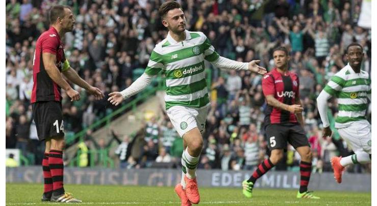 Football: Rogic on scoresheet as Celtic ease to victory 