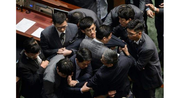 Hong Kong backs China bid to bar rebel lawmakers 