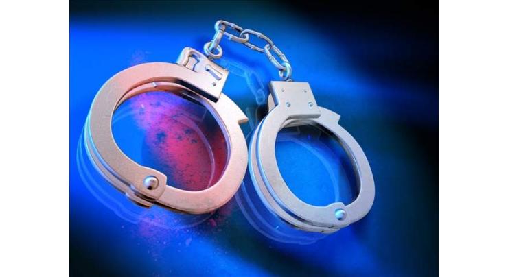 10 arrested during raid on sex den 