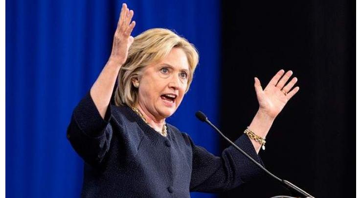 Clinton fans unite in 'Pantsuit Nation' 