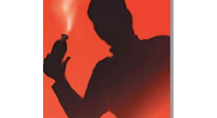 Four booked for throwing acid on woman 