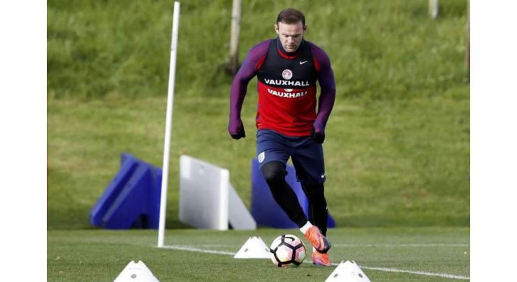Football: Rooney to make England return against Scotland 