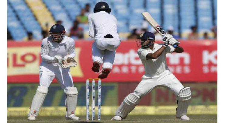 Pujara, Vijay lead India's strong batting reply 