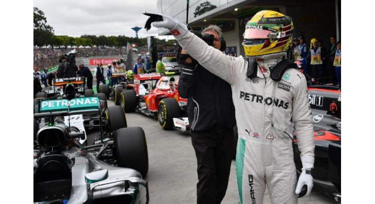 Formula One: Hamilton edges Rosberg for Brazilian pole 