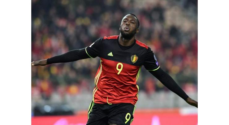 Belgium rampant, Portugal survive scare in qualifiers 