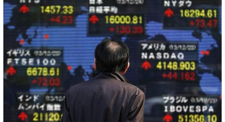 Asian markets hit by Trump fears, weak yen lifts Tokyo 
