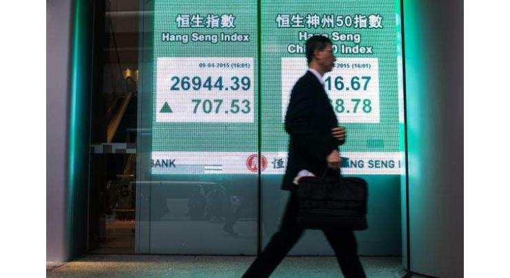 Hong Kong stocks tick up at open after sell-off 