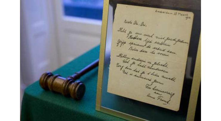 Anne Frank poem fetches 140,000 euros at Dutch auction 