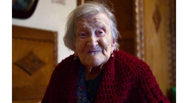 Does my hair look OK? World's oldest person turns 117 in style 