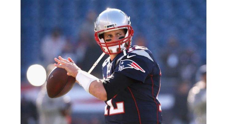 NFL: 'Walking legend' Brady seizes all-time win mark 