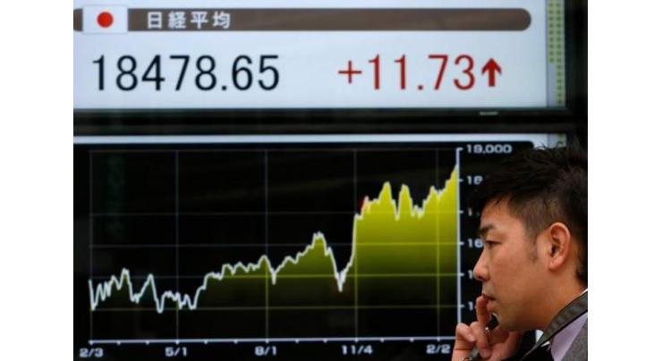 Tokyo stocks up at break after strong US data 