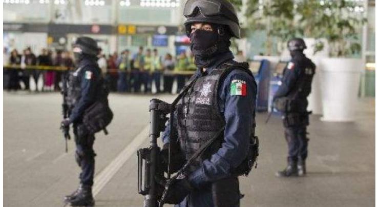14 suspects killed in shootout with Mexico police 