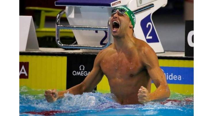 Swimming: Le Clos breaks 100m fly world record to win world short course gold 