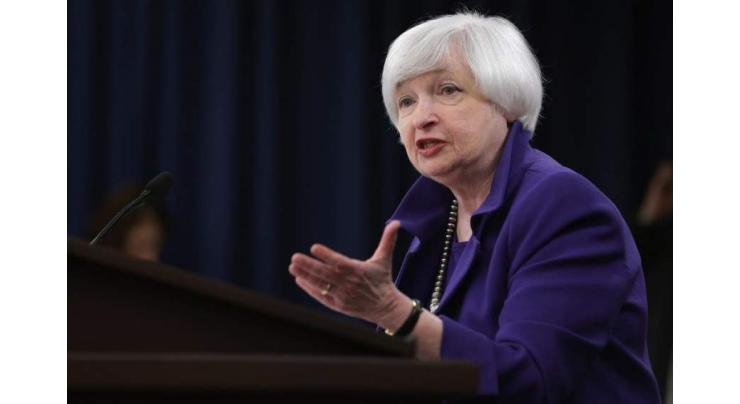Fed raises key interest rate, sees three hikes in 2017 