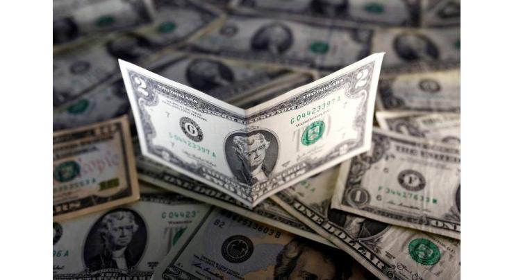 Dollar surges, Asia markets dive on Fed rates signal 