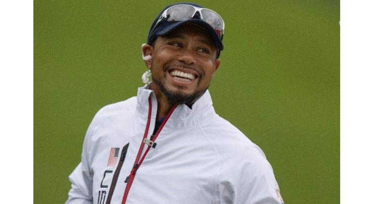 Golf's Tiger Woods hits the links with Donald Trump 